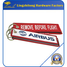 Stickerei entfernen vor Flug Keychain